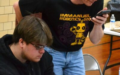 Local robotics event leader receives state award